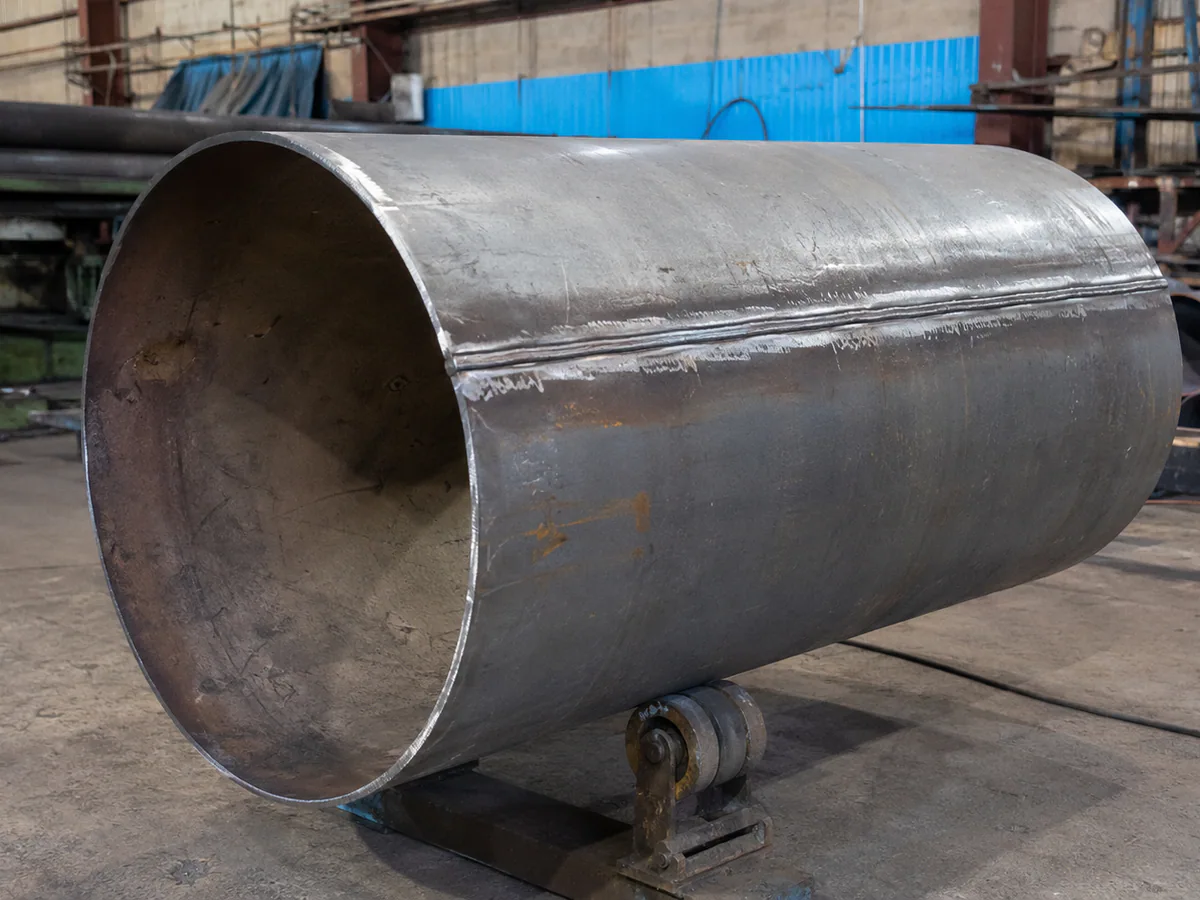 Conveyor pulley shells in a fabrication workshop