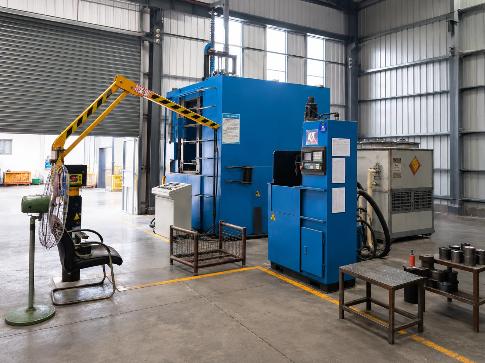 Industrial heat-treatment and quenching equipment in a workshop