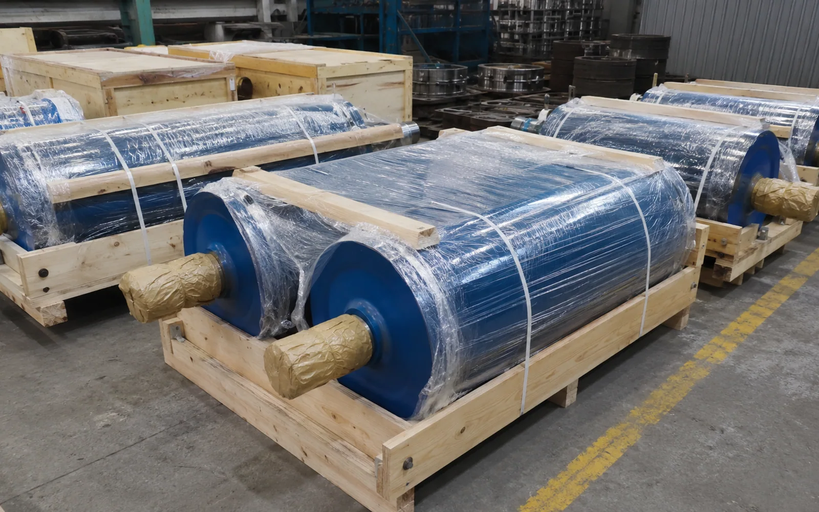 Industrial components protected and secured in wooden export packing frames