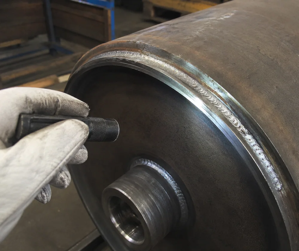 Visual inspection of a weld and machined interface on a fabricated assembly