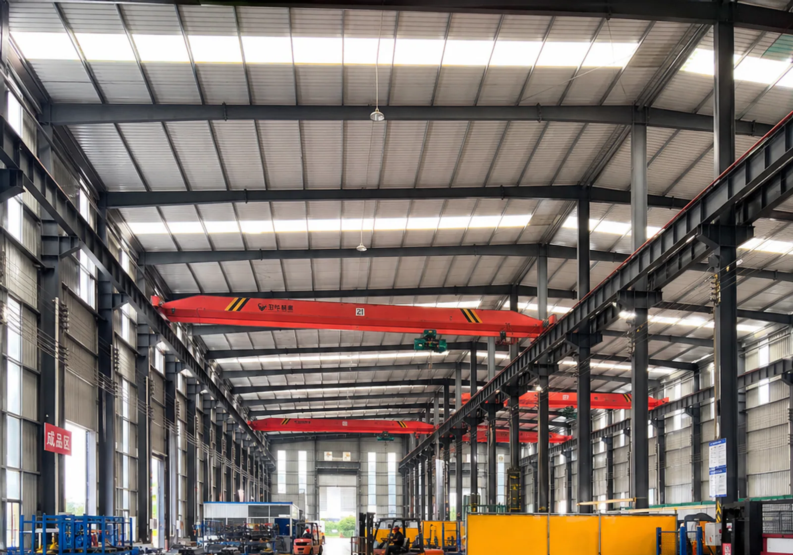 Material preparation and fabrication aisle inside a metalworking workshop