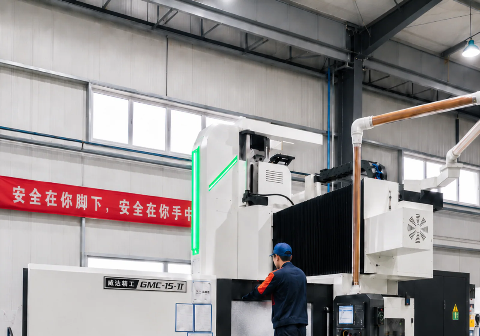 Chinese operator working at a CNC gantry machining center