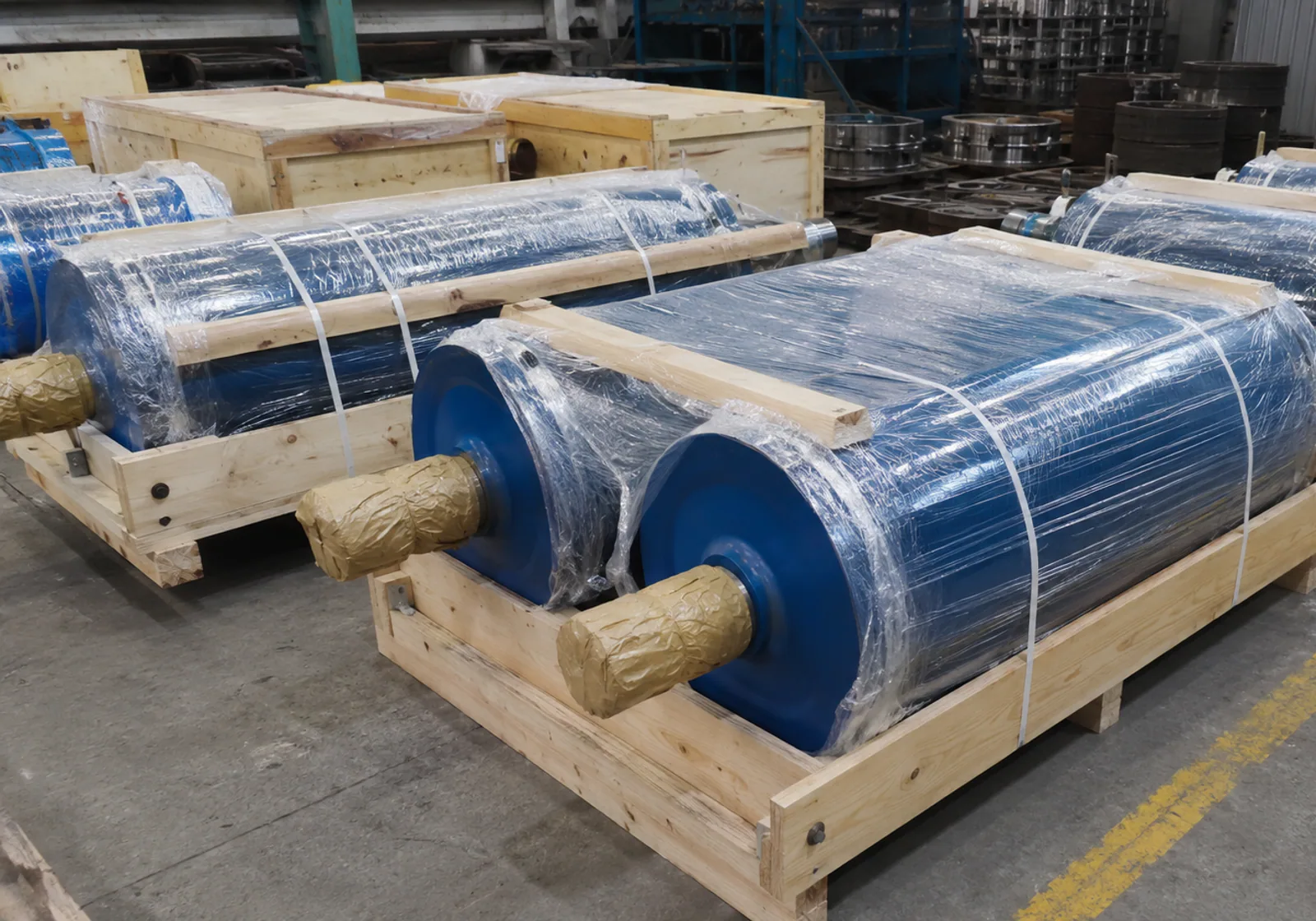 Conveyor pulleys protected in wooden export packing frames