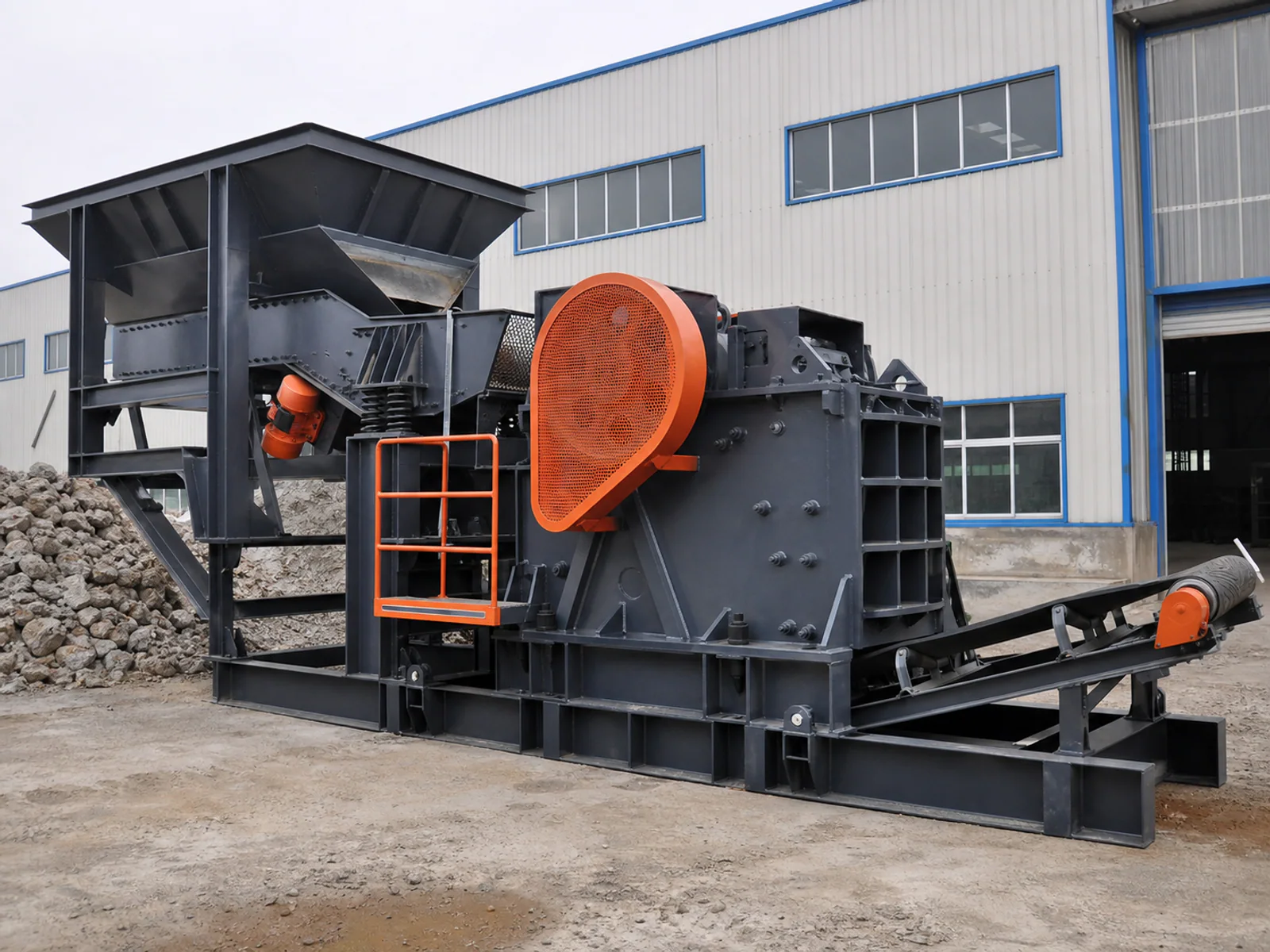 Compact jaw crushing line showing feed hopper, guarded jaw crusher and discharge conveyor